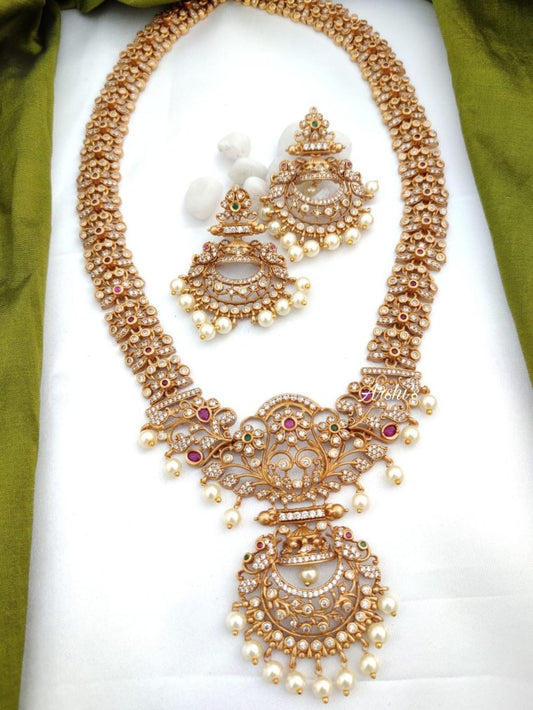 ong pearl imitation necklace set with antique gold finish and stone work bridal jewellery
