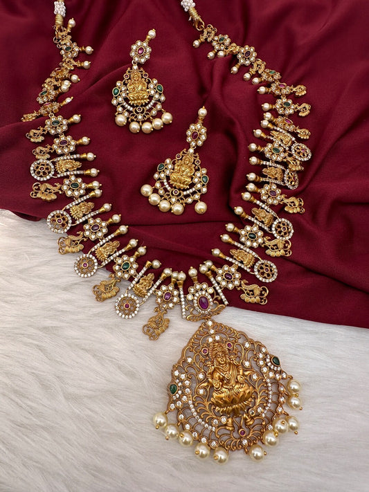 heavy lakshmi temple imitation necklace set with AD stones and pearl drops bridal jewellery